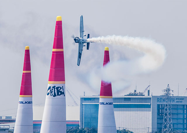 Michael Goulian of the United States performs during the second stage of the Red Bull Air Race World Championship in Chiba, Japan. Photo by Andreas Langreiter/Red Bull Content Pool.