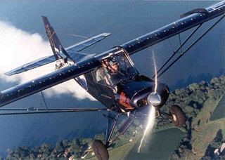 Sky Magic, in effect a souped-up Super Cub, wrote the messages over New Orleans with Nathan Hammond at the controls. Photo courtesy of Olivers Flying Circus.