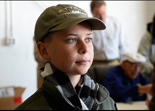 Josh Boulet, an eighth grader at Delaware's Wilmington Christian School, flew in "Panchito," a restored North American B-25 Mitchell so he could visit with Lt. Col. Dick Cole, rear, one of the two surviving Doolittle Raiders from World War II, for a school project on the raid. Photo by David Tulis.