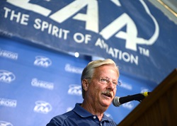 Experimental Aviation Association Chairman and CEO Jack Pelton delivers the closing press conference at 2015 EAA AirVenture in Oshkosh, Wisconsin. Photo by David Tulis.