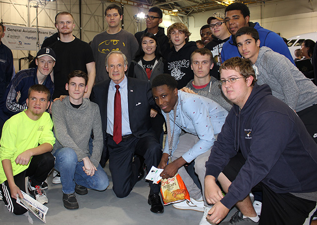 U.S. Senator Tom Carper (D-Del.) gets together with students at Dassault Falcon Jet in Wilmington, Delaware, during a General Aviation Manufacturers Association jobs rally that highlighted the state's general aviation's economic engine Nov. 20. Photo courtesy of GAMA.