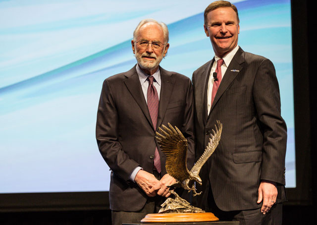 Joe Clark, left, accepts the Meritorious Service to Aviation Award from NBAA President Ed Bolen. Photo courtesy of the National Business Aviation Association.