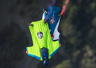 Rex Pemberton (13) of the United States and Lauren Frat (06) of France collide during the Red Bull Aces, a wingsuit four-cross race, in Cloverdale, California, Oct. 24. Joerg Mitter/Red Bull Content Pool.