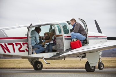 Loading family into airplane