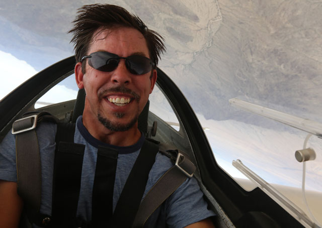 Jason Stephens, five-time U.S. aerobatic champion, inverted over Estrella Sailport in Arizona. Jim Moore photo.