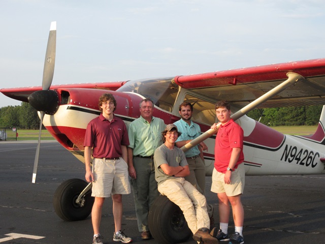 The five pilots in the Osborne family (left to right): Carter, Mike, Will (sitting), Brady, Logan.
