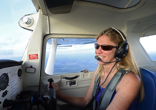 Aerobatic instructor Catharine Cavagnaro smiles as she pilots her Cessna Aerobat “Wilbur” at Ace Aerobatics School in Sewanee, Tennessee. Cavagnaro, a spin training expert, will speak at AOP’s Tullahoma Regional Fly-In Oct. 10. Photo by David Tulis