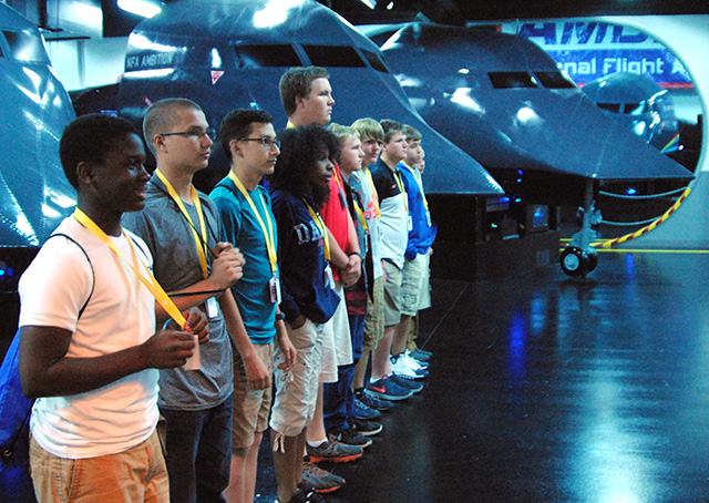 The National Flight Academy’s aviation-themed learning environment at Florida’s Naval Air Station Pensacola allows students in grades 7-12 to live in staterooms, eat in mess halls, and practice aviation maneuvers on flight simulators while learning science, technology, engineering, and math concepts. Photo courtesy of the National Flight Academy.