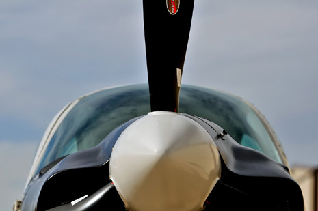 The QU–22's pronounced cowling hump was necessitated by what aircraft handbooks called an alternating-current generator (right) to power its payload of electronics. The cowling has been cut down since its service in Vietnam.