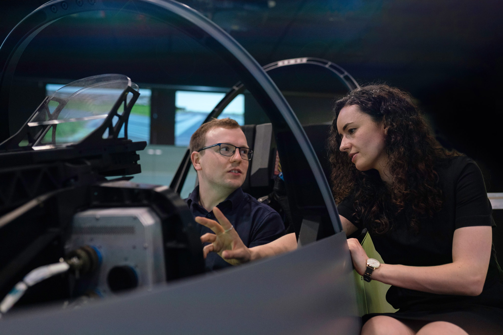 Picture of a flight simulator, a common technology used to gain familiarity with flight controls and techniques before the flight hours portion of your pilot’s license requirements. 