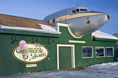 Pike's Aviator Greenhouse and Sweets gets its name from being on the main road from the Fairbanks airport to town, and of course from the DC–6 on its roof. Business was scarce at 8 deg. F.